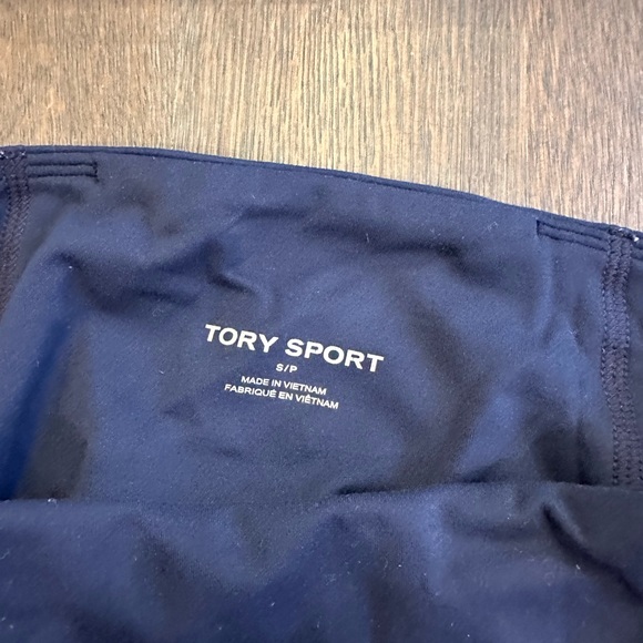 Tory Burch navy leggings with multicolor Chevron at the bottom. Size extra small - Picture 2 of 6